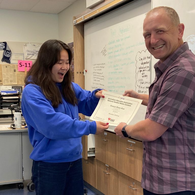 Student receiving Journalism Award - funded by CAF-PTSA mini grants