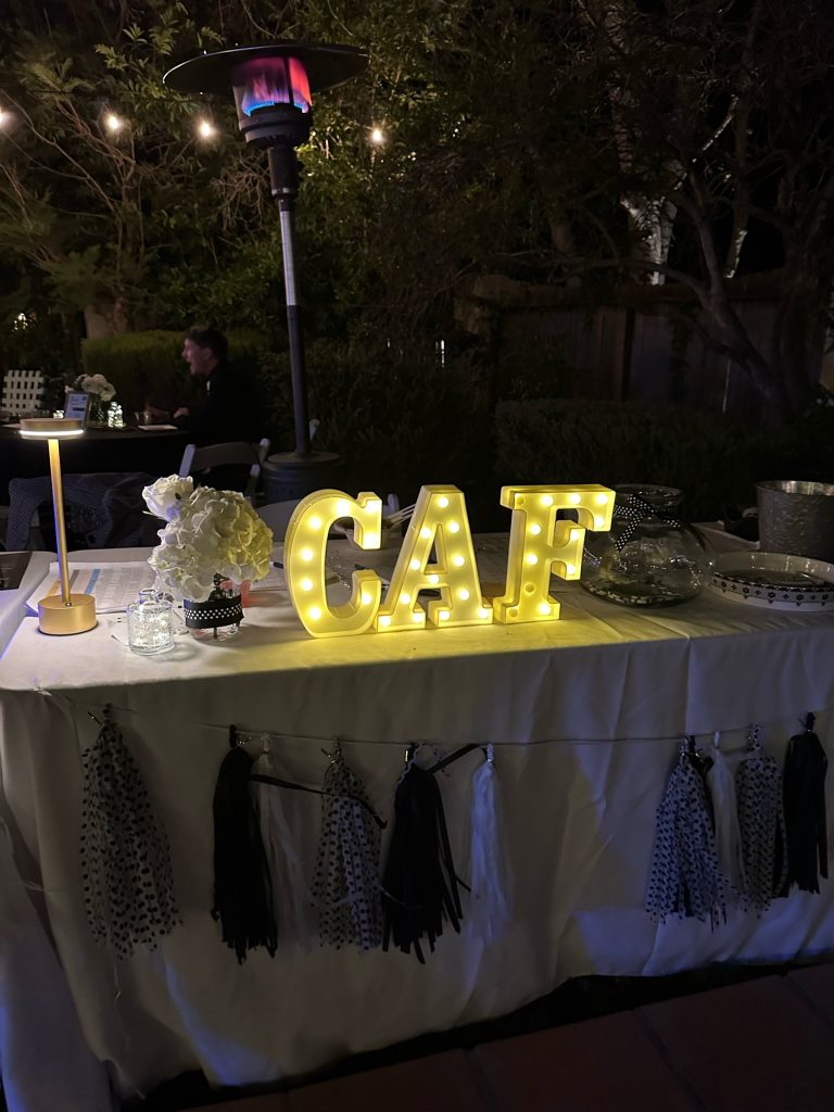 Bagpiper Bash 2023 lit up CAF sign