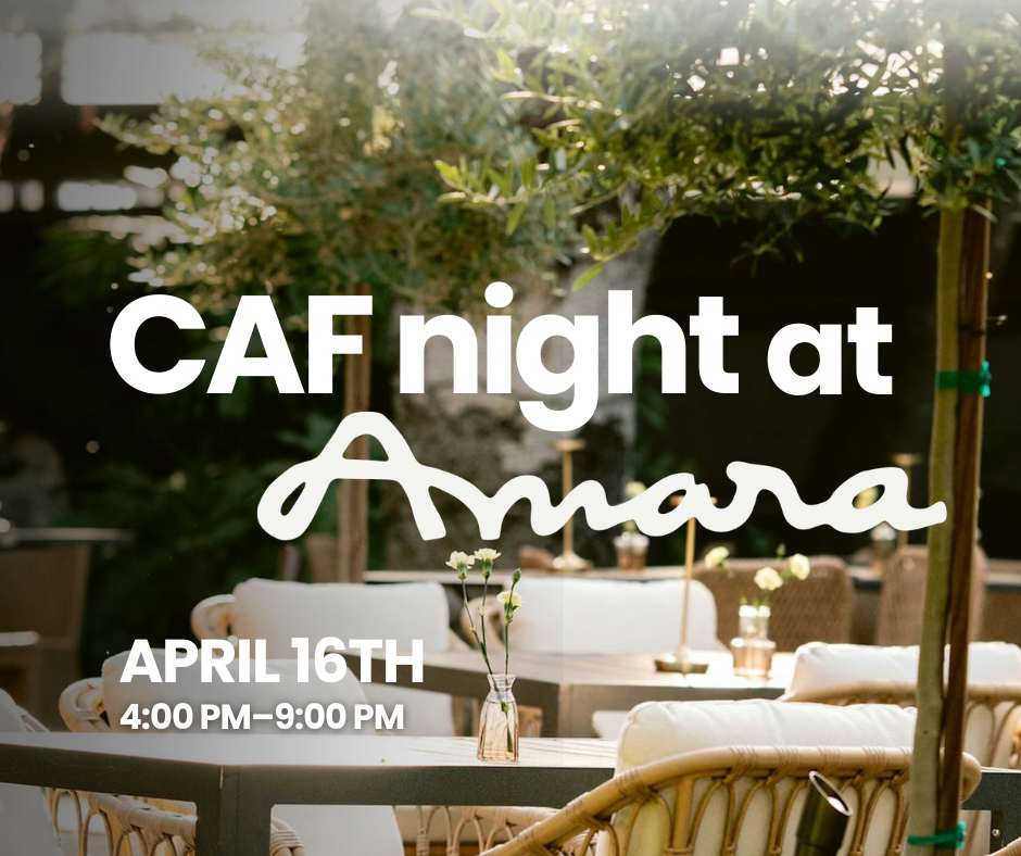 Outdoor patio dining setting at Amara Restaurant with tables, chairs, and greenery