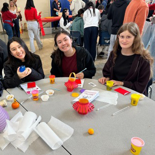 Students in Chinese class working on cultural project