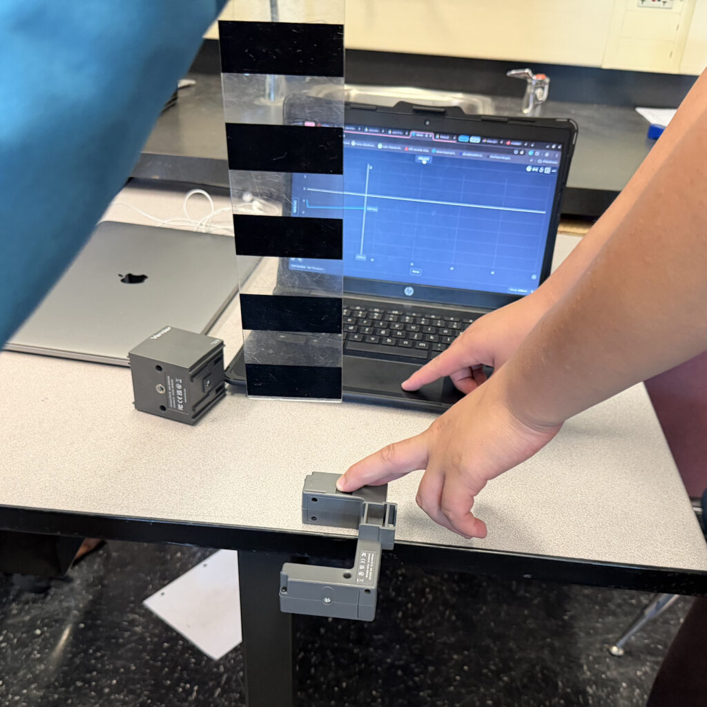 Students using laptop and Mechanical Waves Exploration Kit